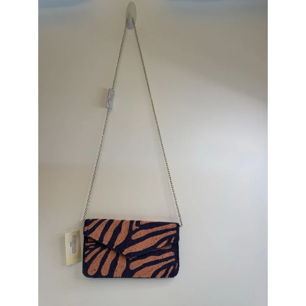 On 34th hand-beaded envelope clutch -navy and coral pink zebra stripe design